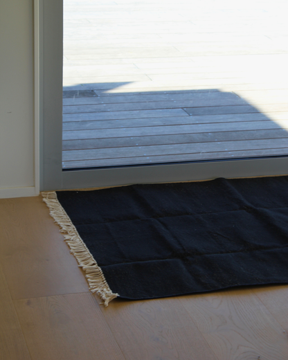 Black Cotton Flatweave Rug with Cream Fringe