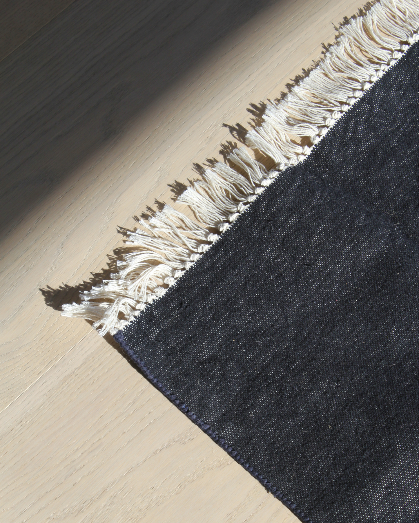 Black Cotton Flatweave Rug with Cream Fringe