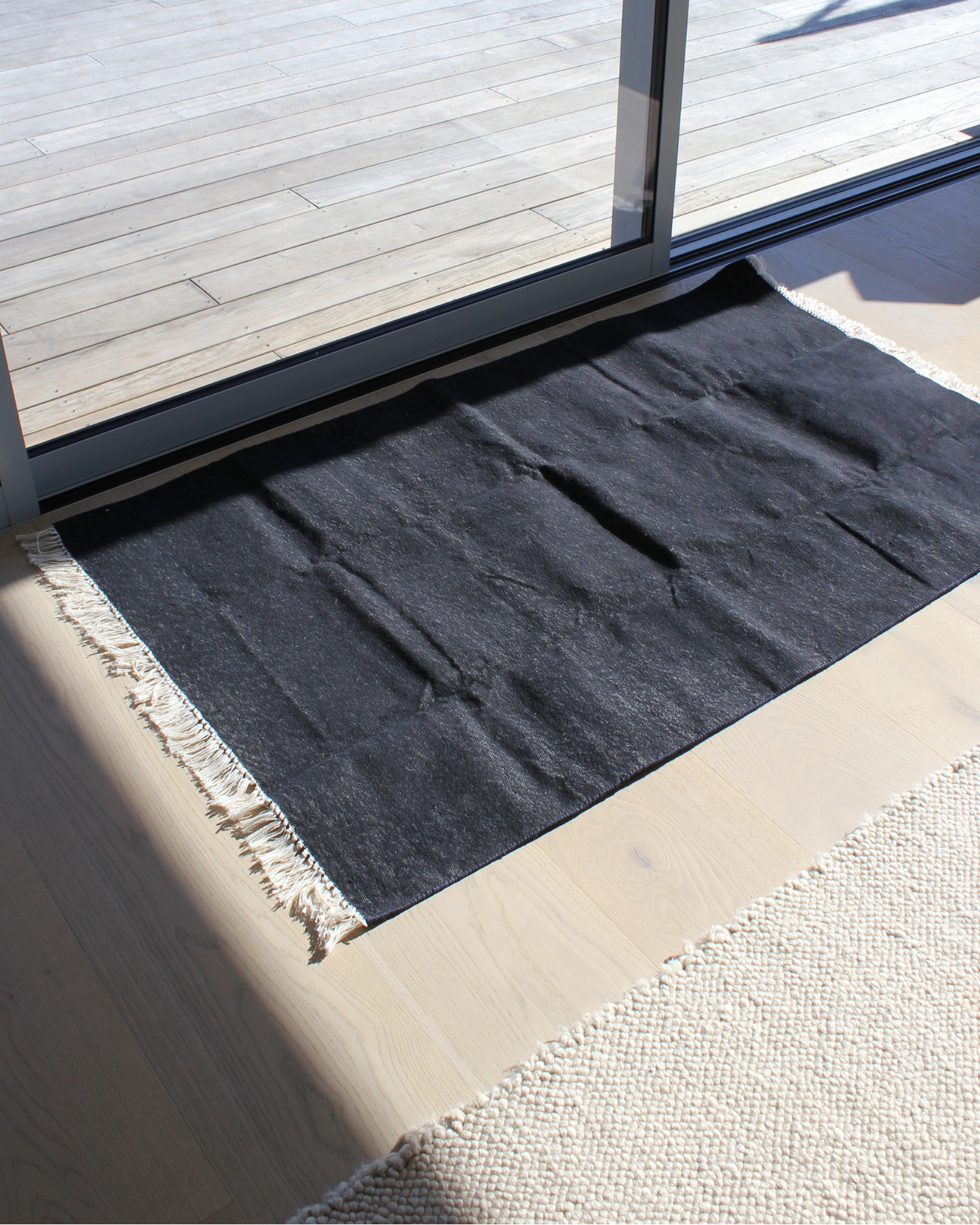 Black Cotton Flatweave Rug with Cream Fringe
