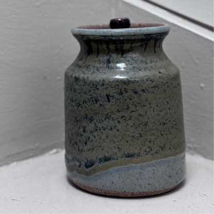 Handcrafted ceramic jar with grey glaze