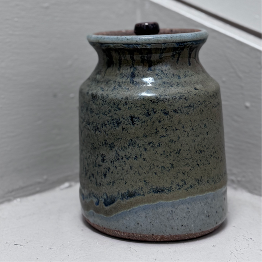 Handcrafted ceramic jar with grey glaze
