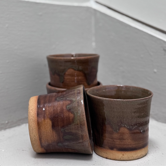 Handmade ceramic tumbler with brown glaze