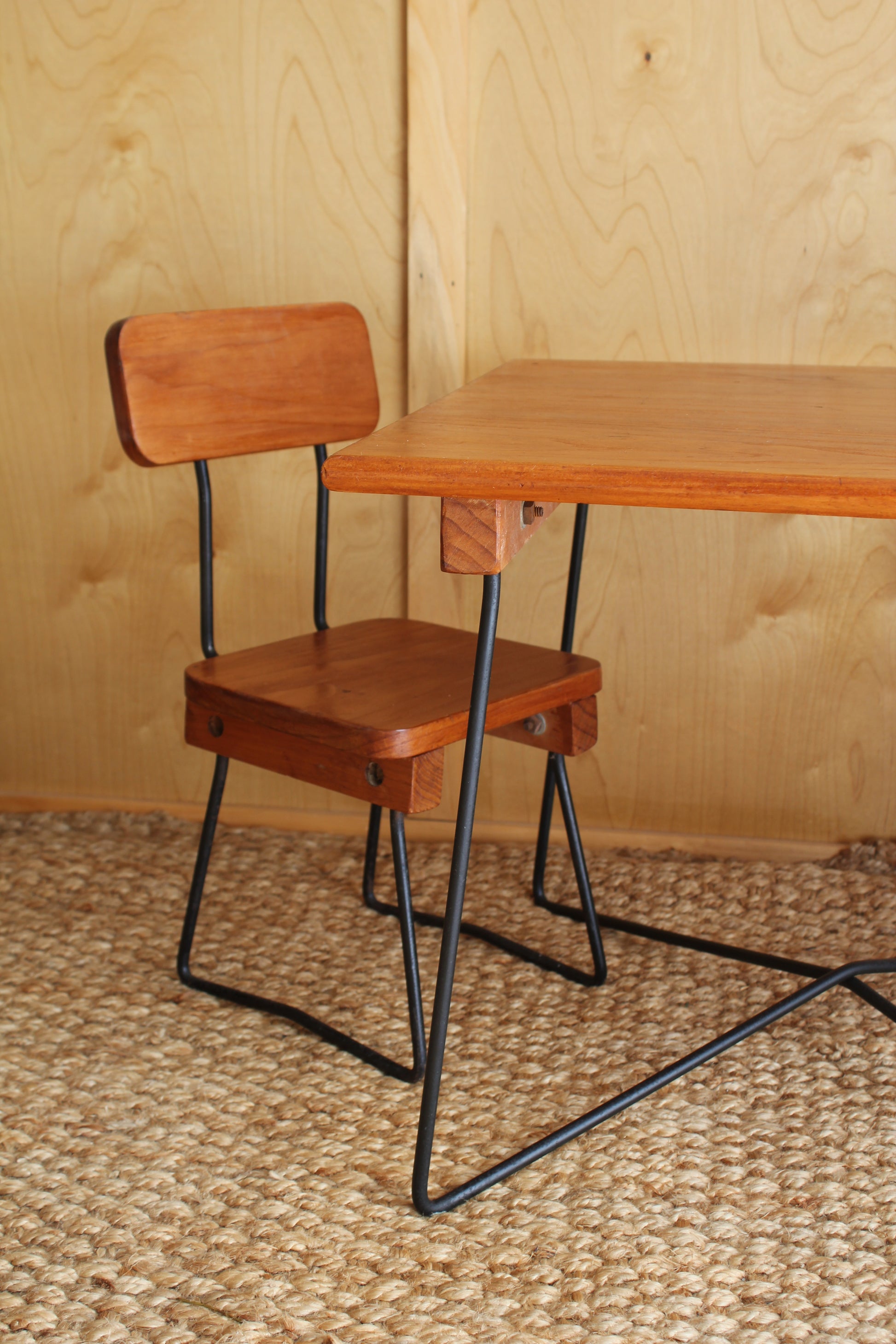 Wooden Vintage Kids Table & Chairs on wooden textured wall.